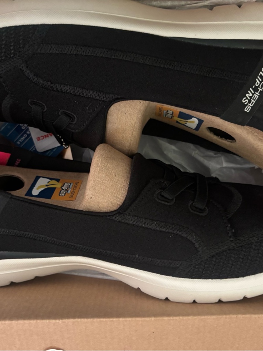 Skechers womans Black Slip-On Style Sneakers on the go with White Sole